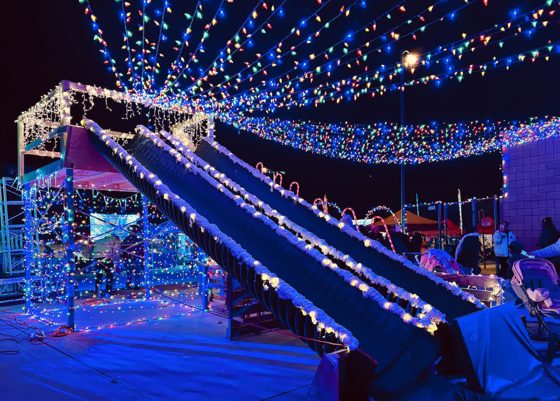 A giant slide covered in lights