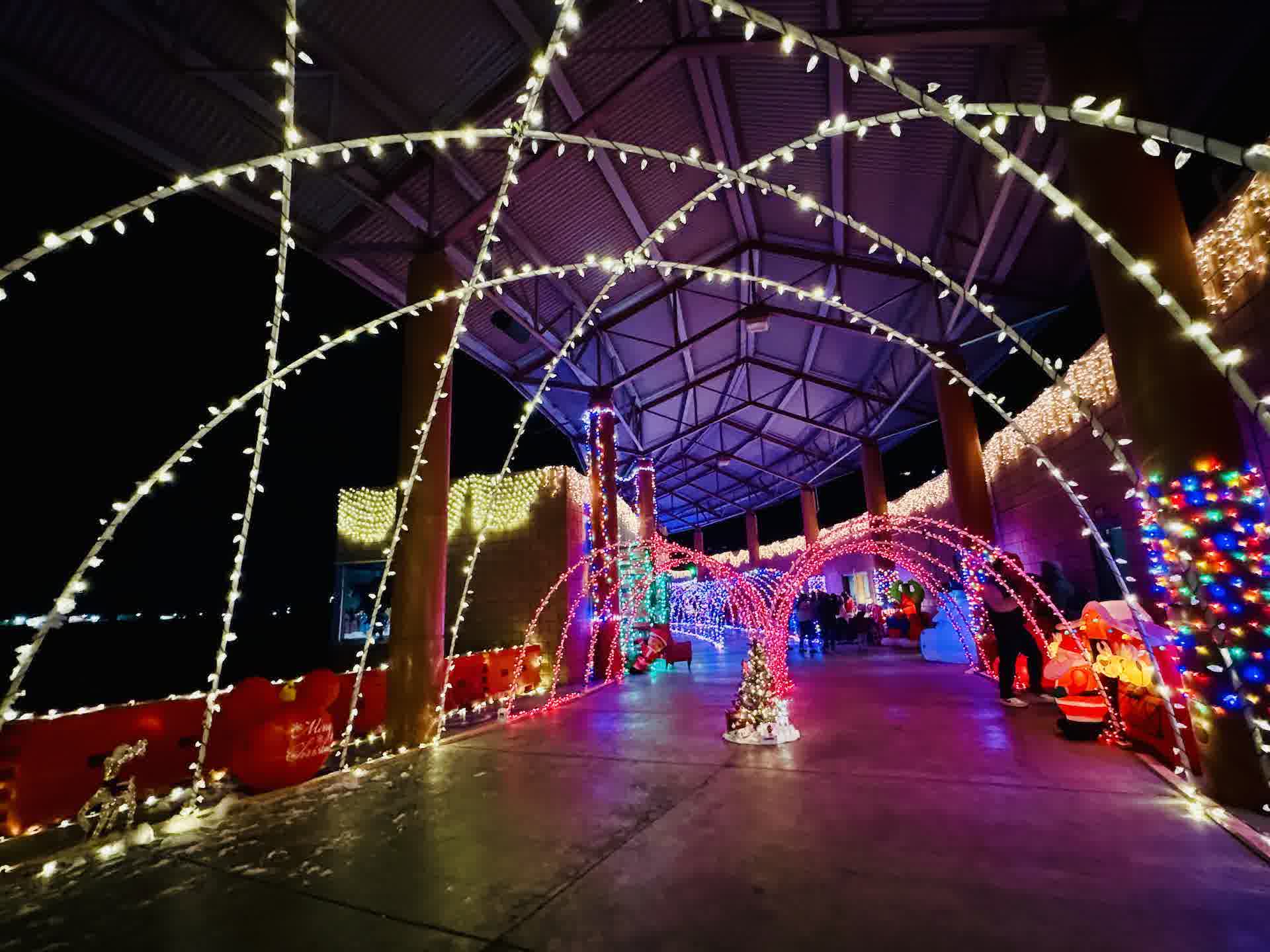 A walkway lined with glowing decorations